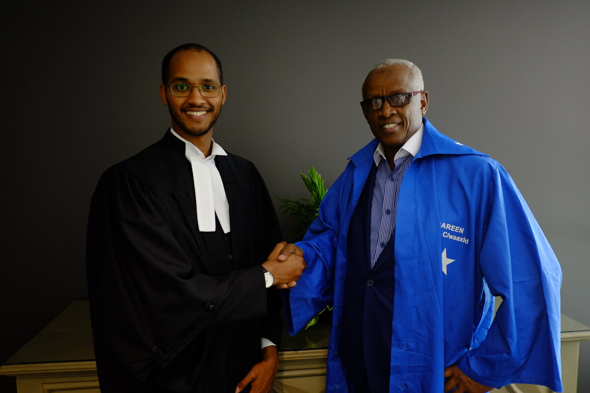Abdiwahid Osman Haji with his son Somali lawyer family legal tradition