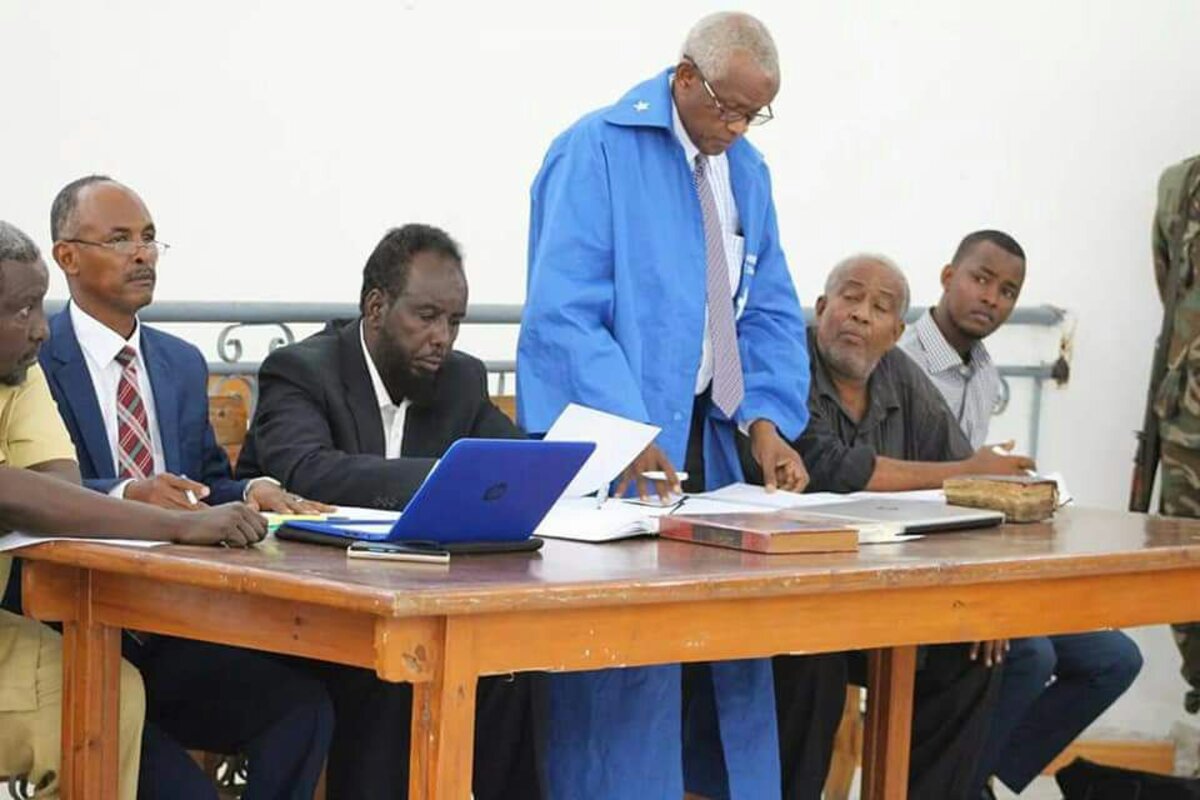 Abdiwahid Osman Haji reviewing case materials court Somalia