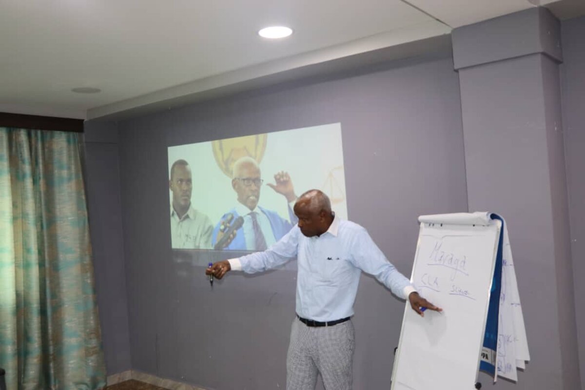 Abdiwahid Osman Haji teaching legal education seminar Somalia SICLE