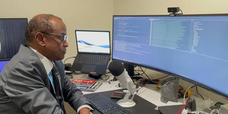 Prof Aweis Osman Ahmed at workstation Mogadishu Law Office Somalia