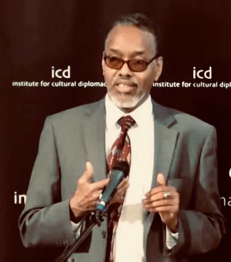 Hassan Farah Warfa speaking Institute for Cultural Diplomacy international education peacebuilding